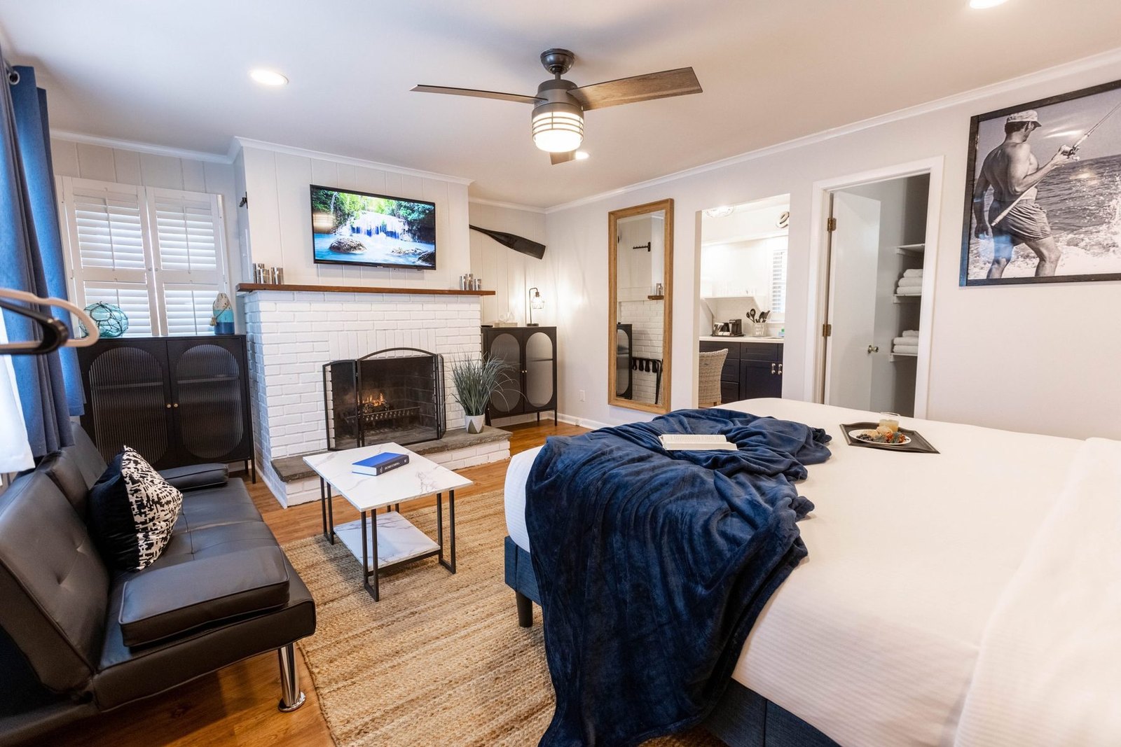 Deluxe King Suite at Ocean View Terrace Inn featuring king bed, fireplace, and full kitchen, Hampton Bays, NY